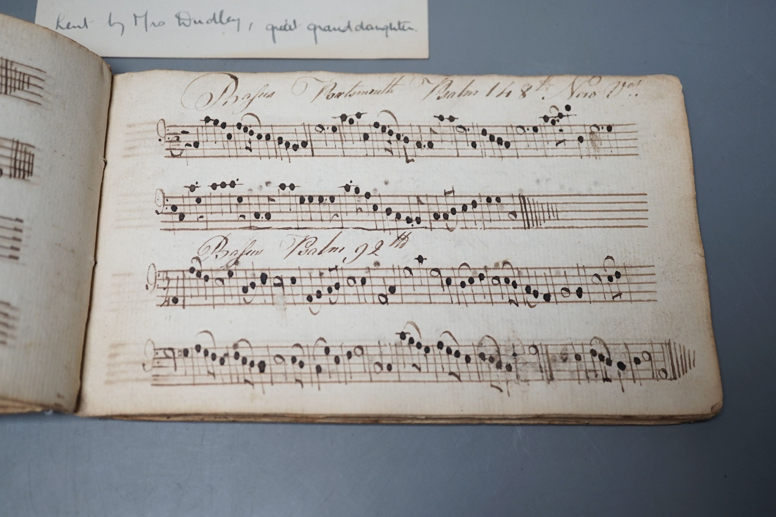 An 18th century book of hand-written psalm notations, inscribed ‘John Cooper his singing book 1794’